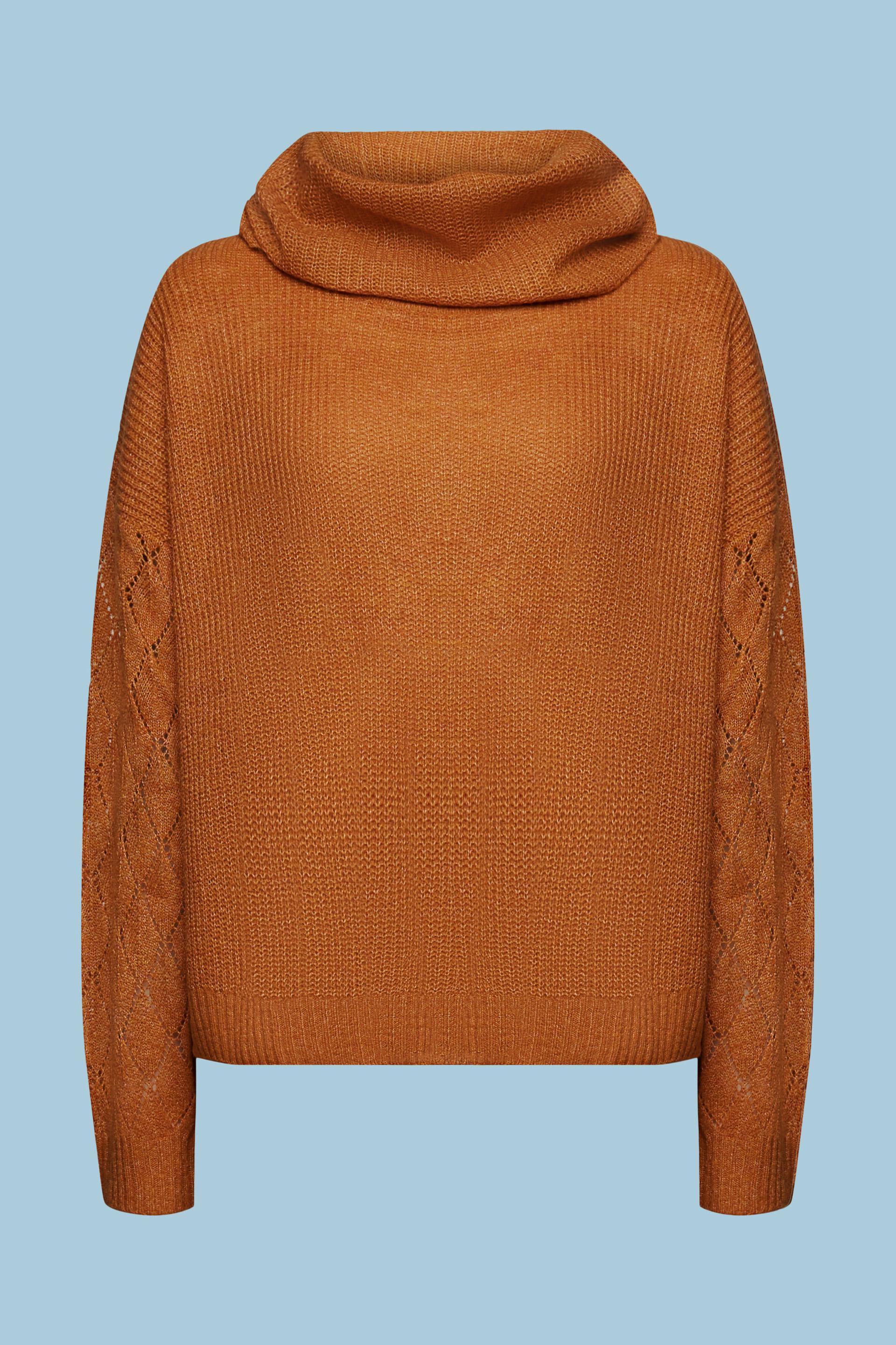 Bruin Stijlvolle en comfortabele mode: Ontdek de Sweater met Watervalhals en Opengewerkte Diamantmouwen